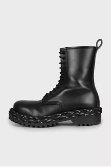 Leather boots decorated with lacing