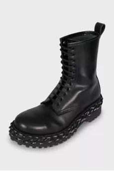 Leather boots decorated with lacing