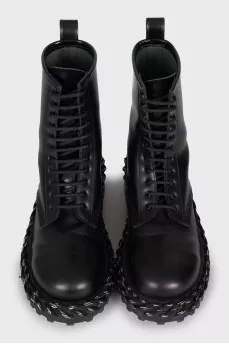 Leather boots decorated with lacing