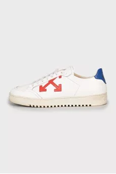 White sneakers with branded decor