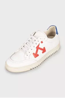 White sneakers with branded decor