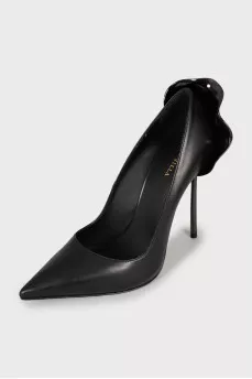 Shoes with metal decor
