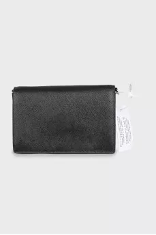 Black leather bag with tag