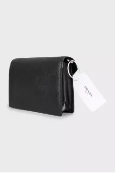 Black leather bag with tag