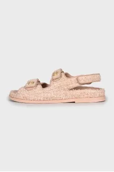 Pink sandals with gold logo