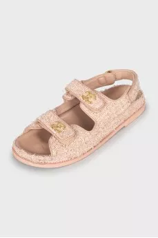 Pink sandals with gold logo