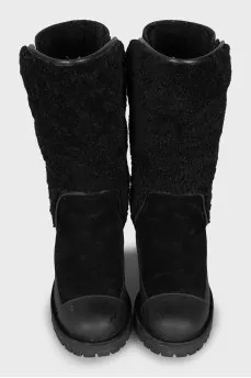Insulated boots made of leather and suede