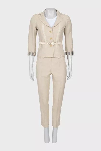 A suit of cropped trousers and a jacket
