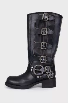 Square toe boots decorated with straps
