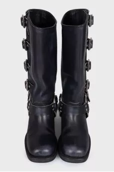 Square toe boots decorated with straps