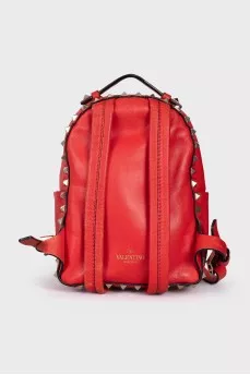 Leather backpack decorated with spikes