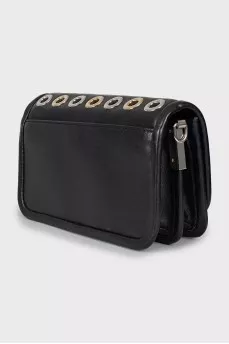 Leather bag decorated with eyelets