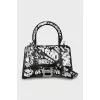 Black and white hourglass bag