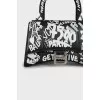 Black and white hourglass bag