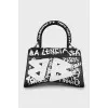 Black and white hourglass bag