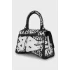Black and white hourglass bag