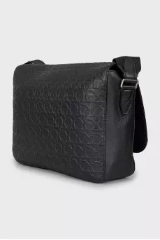 Leather bag with textile strap with tag