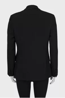 Woolen jacket with a button
