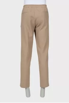 Men's beige trousers with tag
