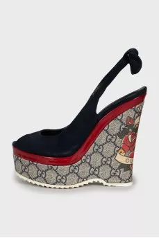 Suede wedge sandals with print