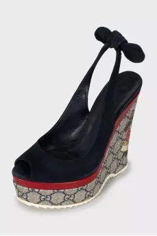 Suede wedge sandals with print