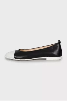 Black and white leather ballet flats