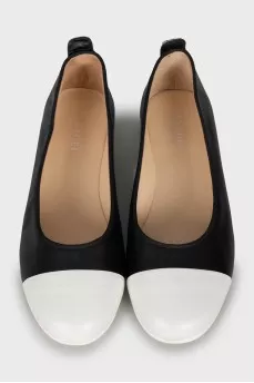 Black and white leather ballet flats