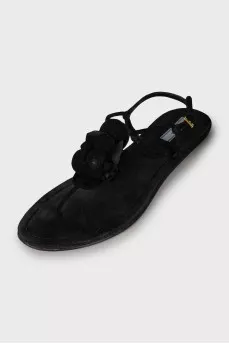 Suede flip flops decorated with a flower