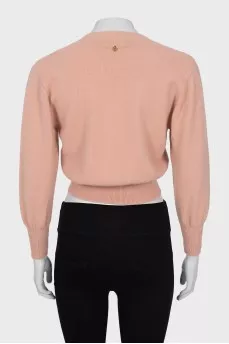 Cropped cardigan made of pink wool