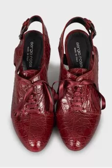 Red leather lace-up shoes