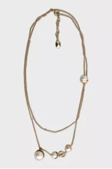 Golden pendant with beads