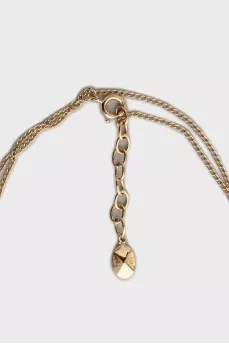 Golden pendant with beads
