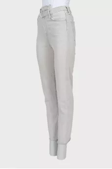Grey jeans with asymmetrical waistband