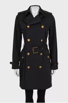 Trench coat with accent buttons