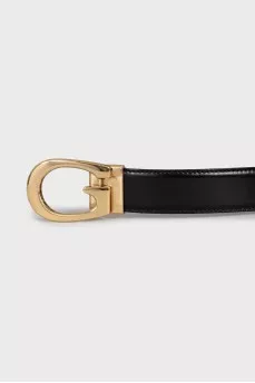 Black leather belt with gold buckle