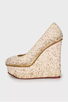 Wedge shoes decorated with sequins