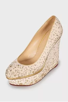 Wedge shoes decorated with sequins