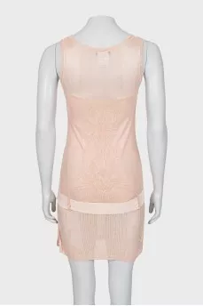 Pink dress decorated with a bow
