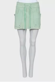 Suede skirt with patch pockets