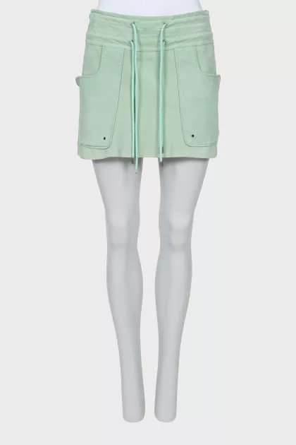 Suede skirt with patch pockets