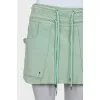 Suede skirt with patch pockets