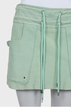 Suede skirt with patch pockets