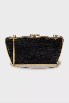 Bag decorated with black rhinestones