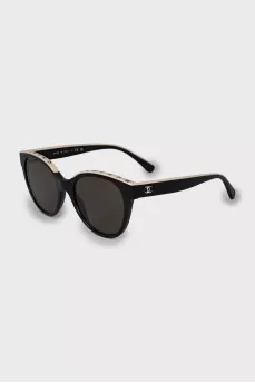 Sunglasses with branded frames
