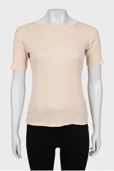 Tight fitting pink t-shirt