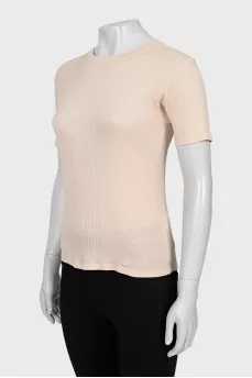 Tight fitting pink t-shirt