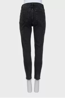 Jeans with raw edges and embroidery
