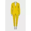Yellow suit consisting of a jacket and trousers