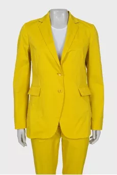 Yellow suit consisting of a jacket and trousers