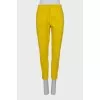 Yellow suit consisting of a jacket and trousers